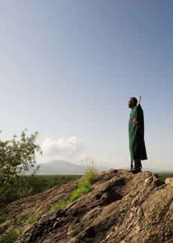 Lake Burunge walking guide on top of a Kopje Lake Burunge walking guide on top of a Kopje