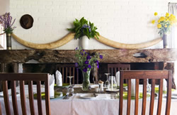 Dining indoors at Ngorongoro Farm House